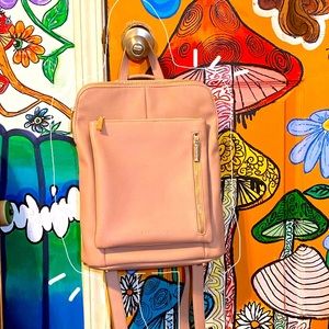 Baby pink pleather Expressions NYC backpack purse.